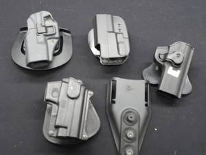 lot 153 image: HARD PLASTIC HOLSTERS