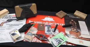 lot 157 image: HOLSTERS AND POSTERS AND GUN CASE