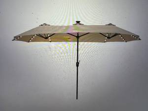 lot 49 image: 13 ft. Steel Market 8-Color Solar LED Lights Patio Umbrella in Beige