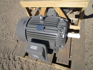 lot 106 image: TECO 30 Motor (see pictures for specs)
