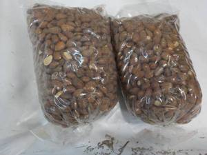 lot 63 image: 2 x 2 lb. Bags Almonds...