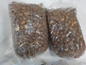 lot 64 image: 2 x 2 lb. Bags Almonds...