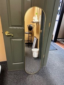 lot 114 image: Oval Mirror Measuring 14 X 54