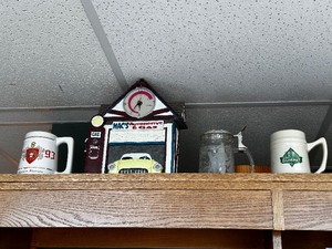 lot 193 image: Variety of Vintage Beer Steins, Mugs, and Vintage Cars as Seen in Photo