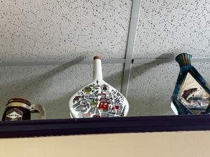 lot 202 image: Vintage Painted Bottle or Vase y Anton Riemereschid, Germany 1970s, Vintage Jim Beam Whiskey Decanter with Big Mouth Bass. and Vintage Grain Belt Beer Stein