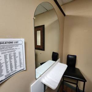 lot 7 image: 2 Curved Top Mirrors Measuring 30 X 40