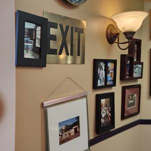 lot 121 image: Variety Artwork As Seen On Wall