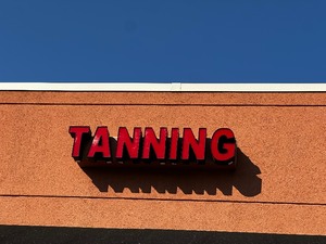 lot 223 image: TANNING Building Sign