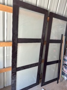 lot 55 image: Unused Sliding  Closet door Set  Mocha Brown Color w Glass Inserts - Minor Damage