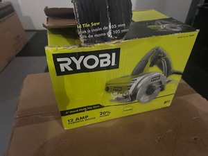 lot 34 image: Unused  Like New Ryobi 4 Hand Tile Saw - Tested Works