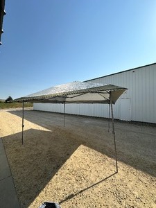lot 16 image: Coleman 13x13ft Instant Canopy Sun Shelter, Portable Shade Tent Sets Up in 3 Minutes, Vented Roof for Airflow, Great for Campsite, Backyard, Tailgates, Beach