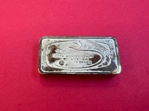 lot 112 image: America Manned Space Flights 10th Anniversary America in Space Sterling Bar