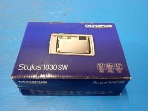 lot 67 image: Olympus&nbspStylus 1030 SW Digital Camera in box with accessories  Includes battery, battery charger and cables