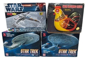 lot 94 image: LOT OF 4 STAR TRACK, STAR WARS, HEN LAYING EGGS