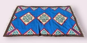 lot 58 image: Vintage Native American textile 68 inches by 100 inches. Very Unique design Vibrant Colors .