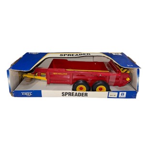lot 72 image: 116 NEW  ERTL HOLLAND TANDEM AXLE MANURE SPREADER