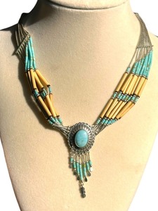 lot 104 image: Vintage Rising Sun Navajo 9-Strand Sterling Silver, Turquoise & Wood Necklace