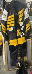 lot 128 image: Vintage Honda Racing Leather Motorcycle Suit with Boots, Size 44