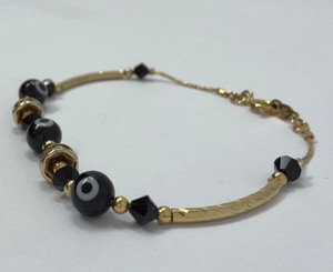 lot 6 image: Chopard-Inspired Floating Diamond Bracelet with Black Evil Eye Beads for Protection, 7.5 Length