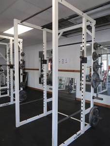 lot 1 image: CYBEX SQUAT RACK