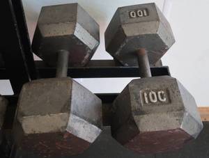 lot 9 image: 100 LB DUMBELLS