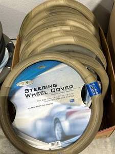 lot 29 image: Lot of 11 New Steering Wheel Covers ($163 retail)
