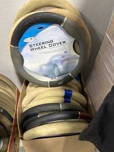 lot 30 image: Lot of 19 New Steering Wheel Covers ($284 retail)