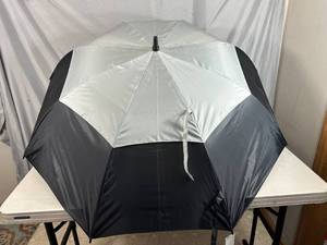 lot 126 image: New Greg Norman 60 inch Golf Umbrella