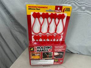 lot 175 image: New 8 Pack of Ruby Holding Hands Magnetic Silicone Ties  Organizers
