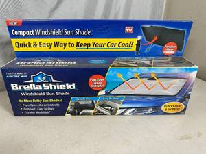 lot 322 image: New Brella Shield Compact Windshield Sun Shade