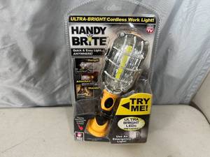 lot 326 image: New Handy Brite Cordless Worklight