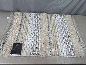 lot 59 image: New Moda Ankara Bath Mat Rug