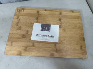 lot 92 image: New Elle Decor Cuttingboard