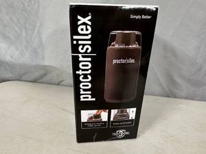 lot 105 image: New Proctor Silex Coffee Grinder