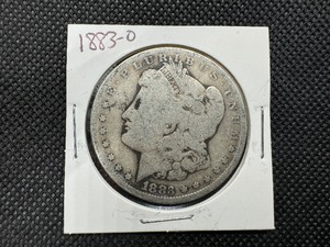 lot 14 image: 1883-O Morgan Silver Dollar