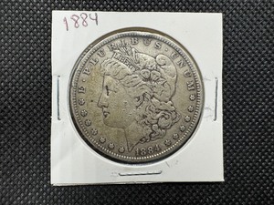 lot 16 image: 1884 Morgan Silver Dollar