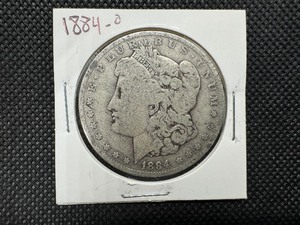 lot 17 image: 1884-O Morgan Silver Dollar