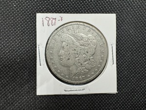 lot 20 image: 1887-O Morgan Silver Dollar