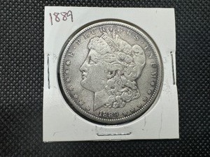 lot 21 image: 1889 Morgan Silver Dollar
