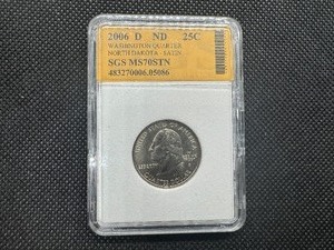 lot 45 image: 2006 D North Dakota Satin Quarter SGS MS70STN