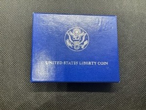 lot 49 image: 1986 Liberty Half Dollar 100th Birthday Coin