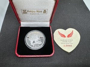 lot 72 image: 1 Ounce Cherub Round with Box and COA