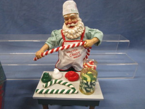 lot 27 image: Peppermint Twist Clothtique Santa
