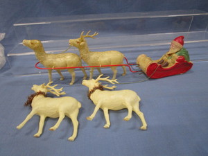 lot 29 image: Antique Celluloid Santa on Metal Windup Sleigh