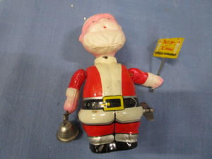 lot 76 image: Windup Vintage Santa Tin Body, Plastic Head