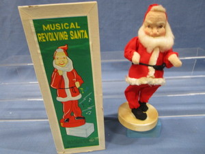 lot 88 image: Musical Revolving Santa 11H