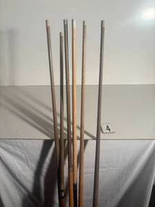 lot 4 image: Various Pool Cues All old and missing tips