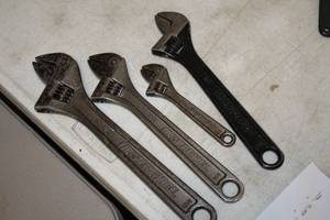 lot 42 image: Lot of (4) Assorted Adjustable Wrenches