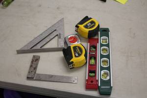 lot 65C image: Lot of (7) Assorted Hand Tools - Levels, Squares, Measuring Tapes