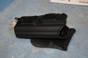 lot 151 image: Scorpion Gear Tactical Handgun Holster
